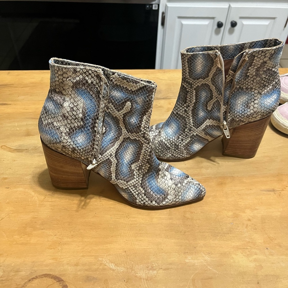 Lovely boots with design.